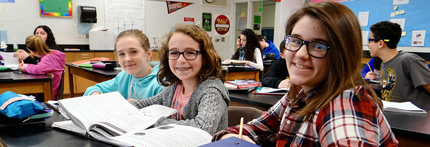 Photo of smiling students in classroom