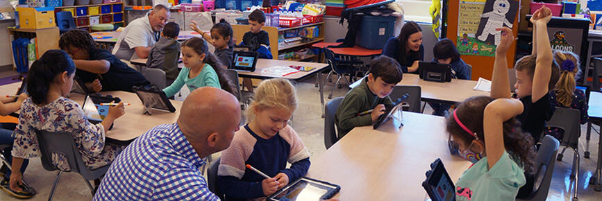 students working in iPads